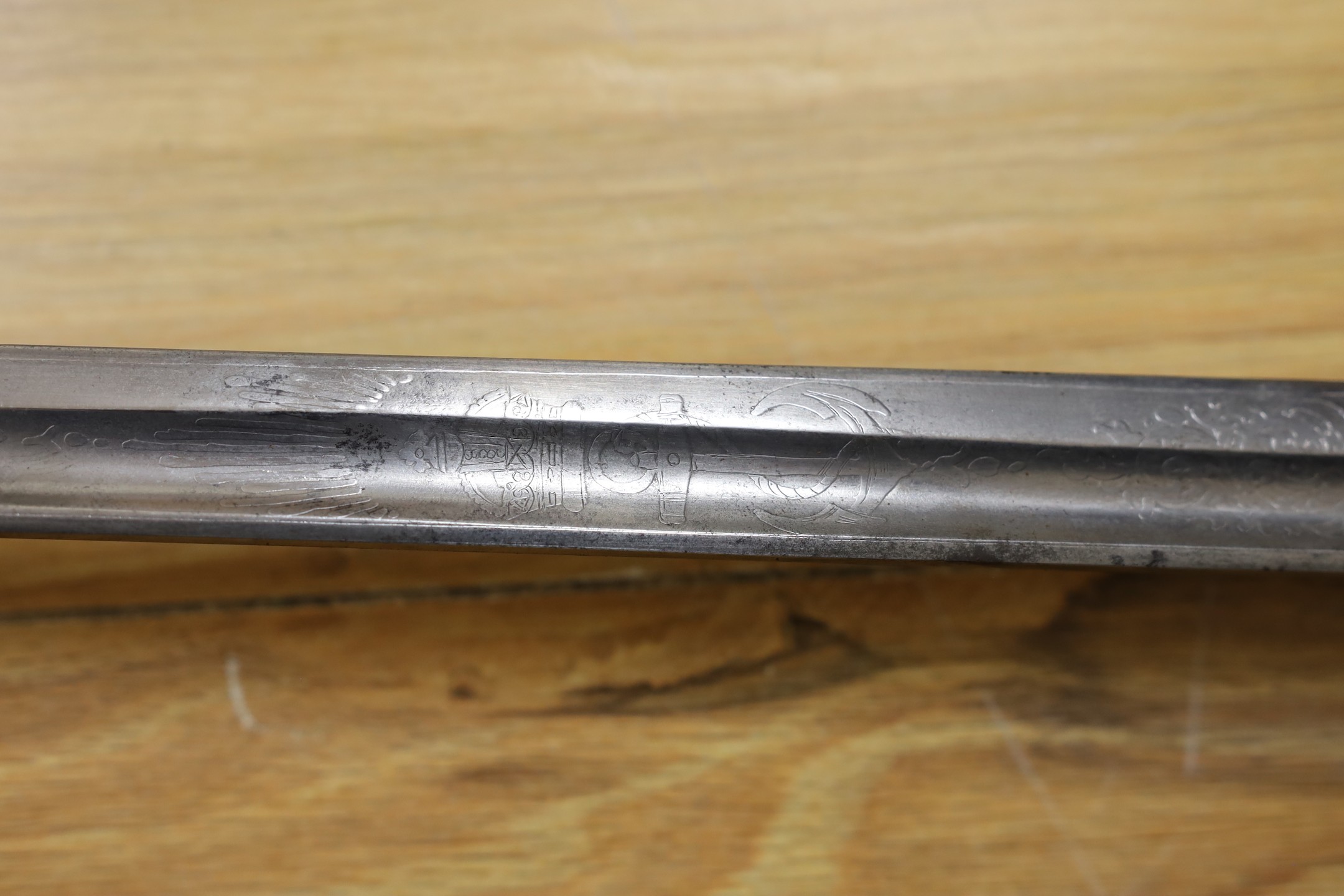 A George V naval officers sword, made by Friedeberg Portsea, serial number 4351 stamped to spine